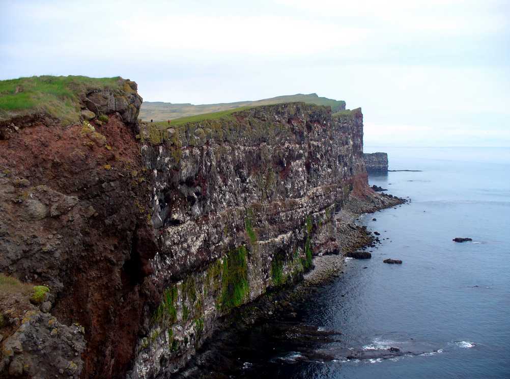 Latrabjarg cliff in Iceland, body of water, blue sky