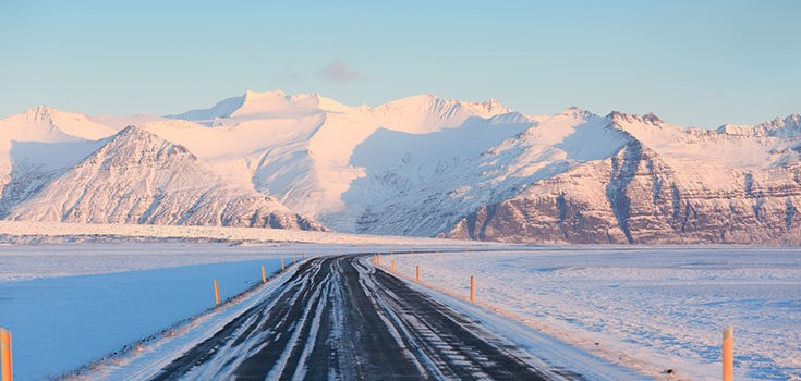 Ring road in winter with mountains on the background, snow, in Iceland