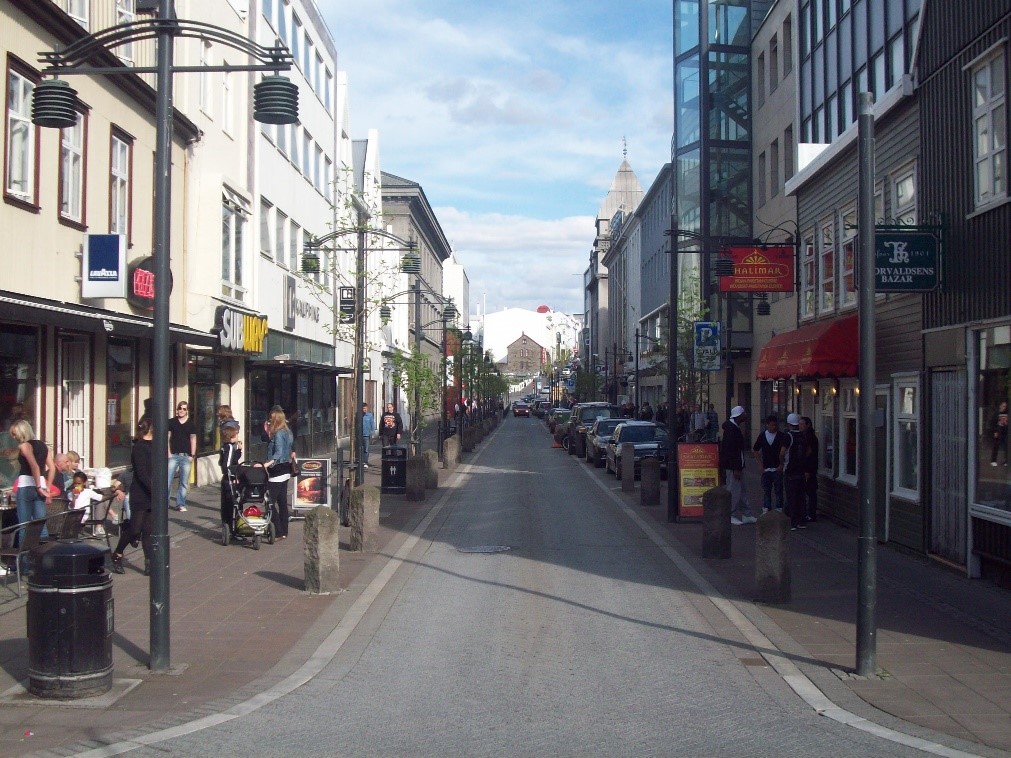 people walking in austurstraeti street ind dowtown Reykjavik